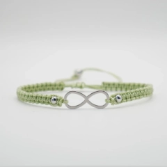 Jasnozielona bransoletka nieskończoność makrama handmade rękodzieło