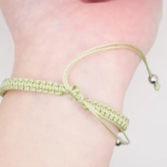 Jasnozielona bransoletka nieskończoność makrama handmade rękodzieło