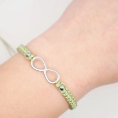 Jasnozielona bransoletka nieskończoność makrama handmade rękodzieło